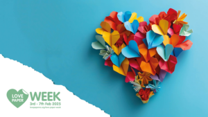 A vibrant array of colorful paper hearts arranged in a heart shape, promoting Love Paper Week from February 3 to 7, 2025.