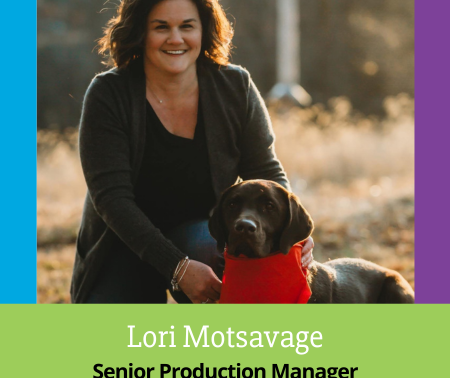 Lori Motsavage, PMG's Senior Production Manager, smiling with her dog. A headshot image within the PMG Blog introduction.