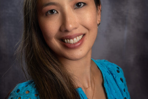 Professional headshot of smiling woman, Jade Nguyen Swanson.